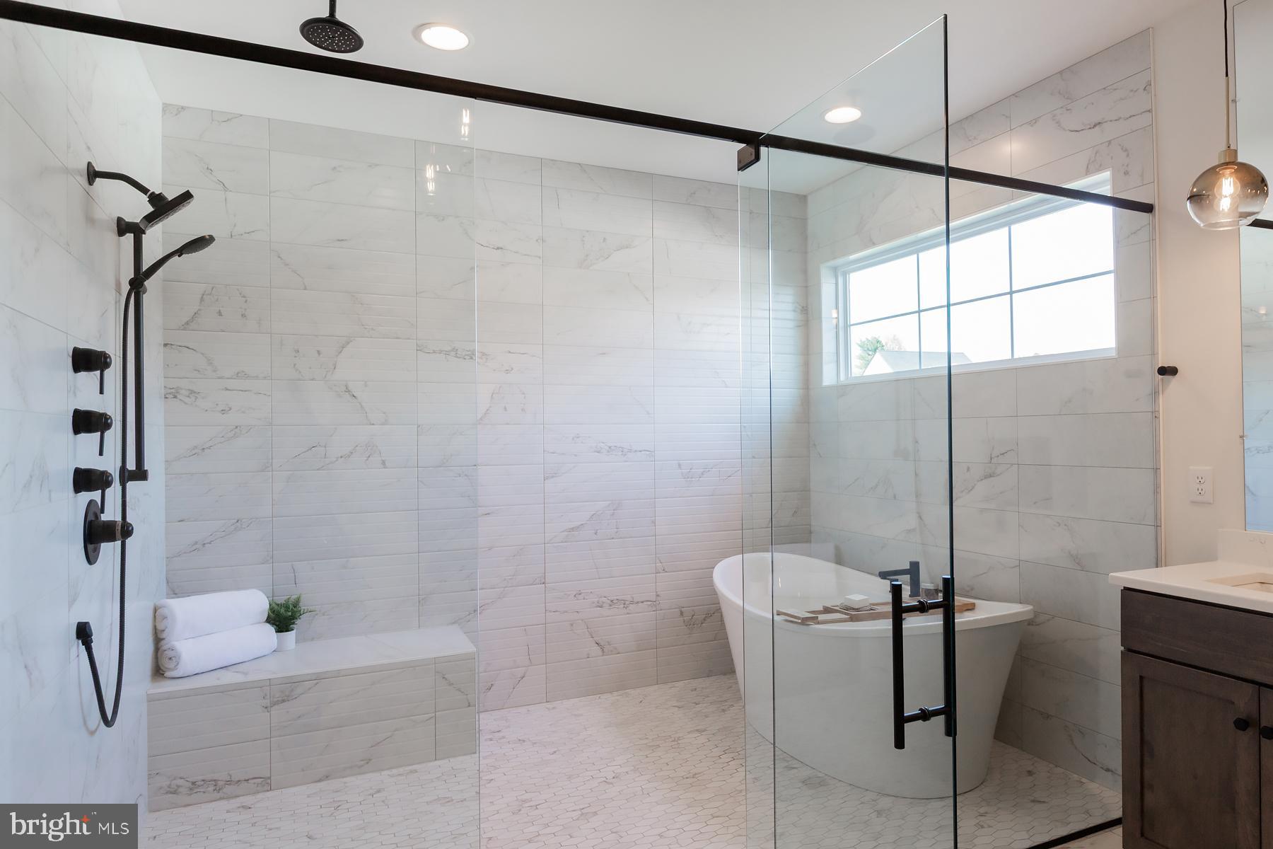 1016 Valley Crossing Drive Lititz, PA 17543 - Photo 54 of 85 a bathroom with a shower and a bathtub