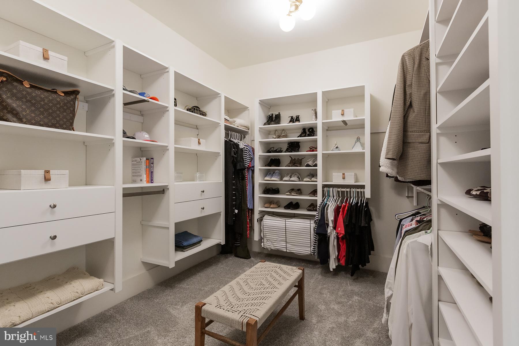1016 Valley Crossing Drive Lititz, PA 17543 - Photo 57 of 85 a view of walk in closet with clothes and shoes