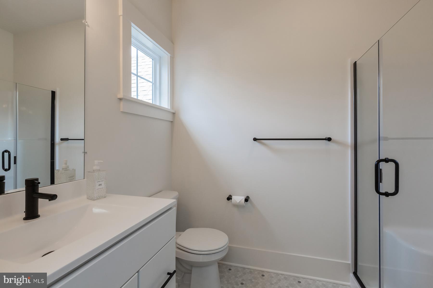 1016 Valley Crossing Drive Lititz, PA 17543 - Photo 61 of 85 a bathroom with a sink toilet and shower