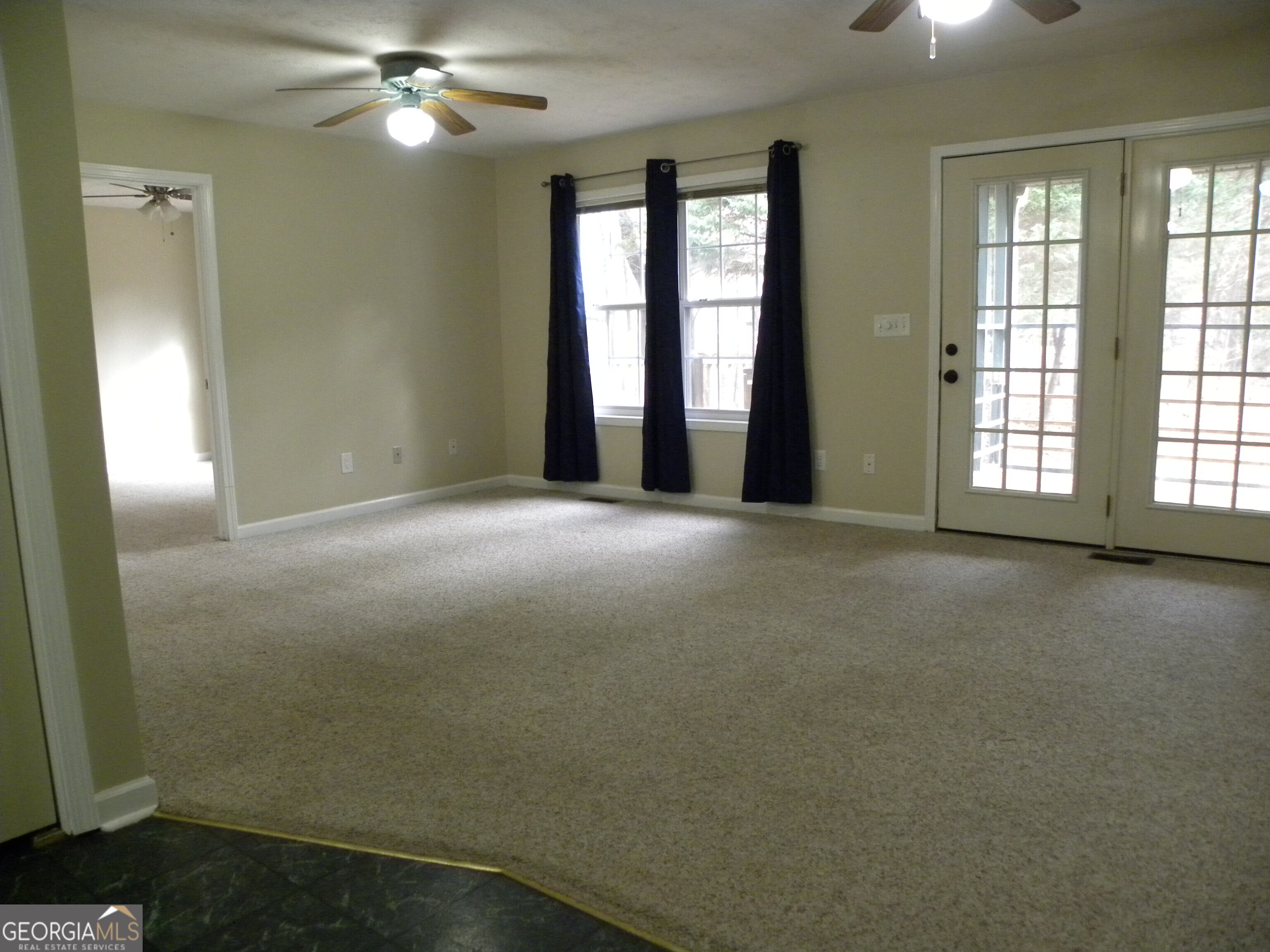 101 And 103 Joy Lane, Unit DUPLEX Hartwell, GA 30643 - Photo 14 of 24 a view of an empty room with a window