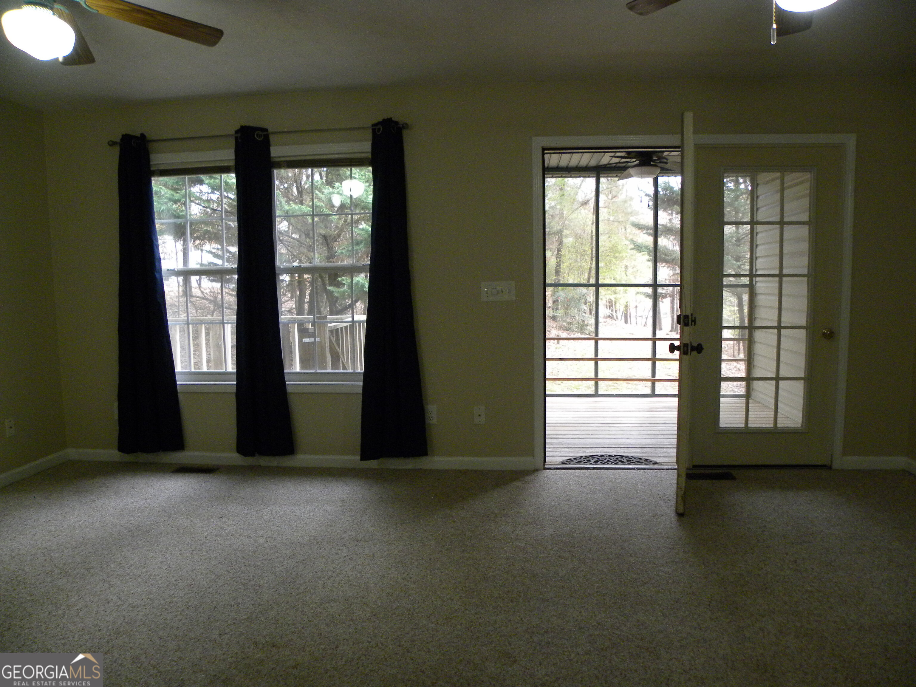 101 And 103 Joy Lane, Unit DUPLEX Hartwell, GA 30643 - Photo 15 of 24 an empty room with windows