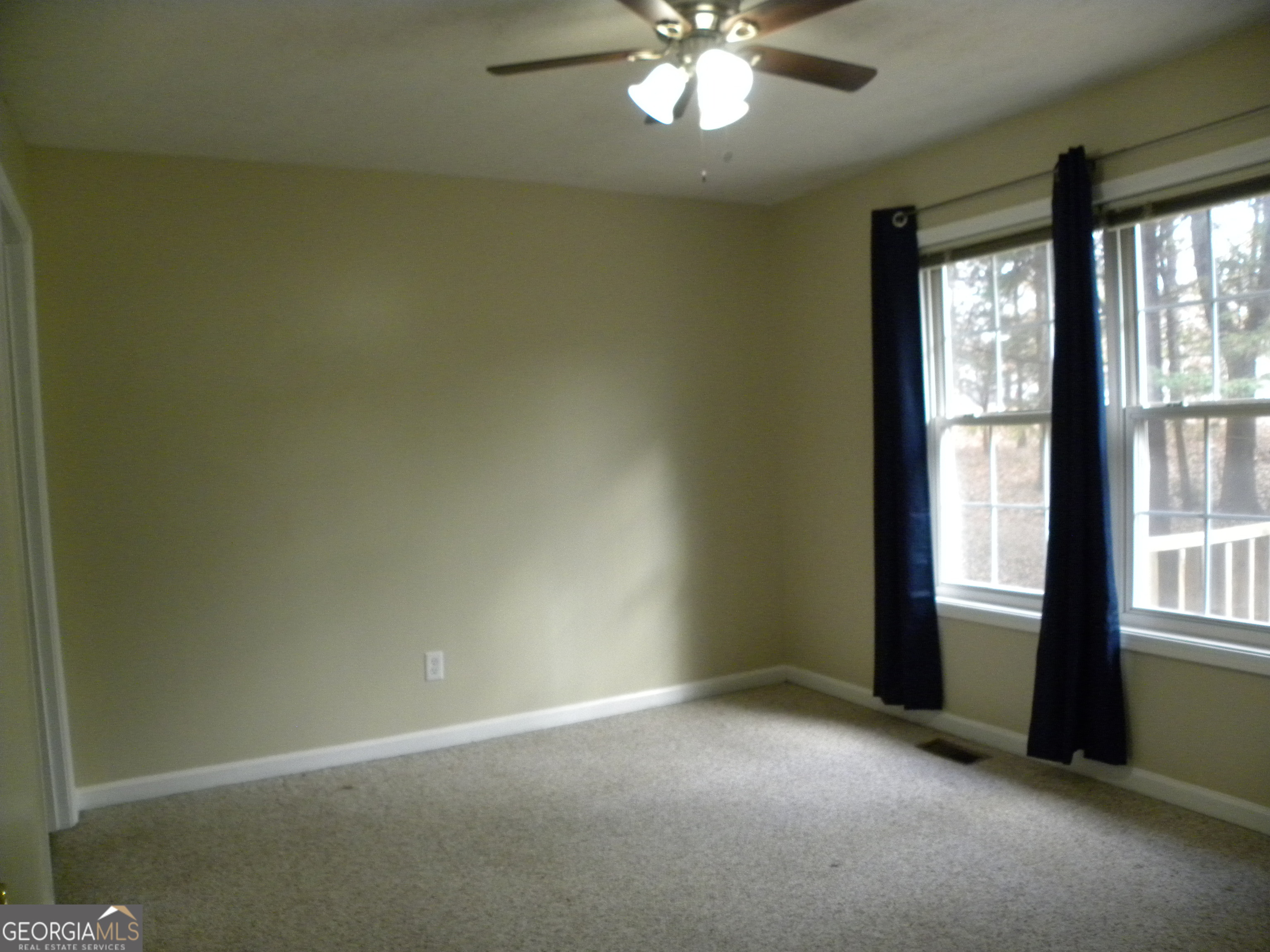 101 And 103 Joy Lane, Unit DUPLEX Hartwell, GA 30643 - Photo 20 of 24 a view of an empty room with a window