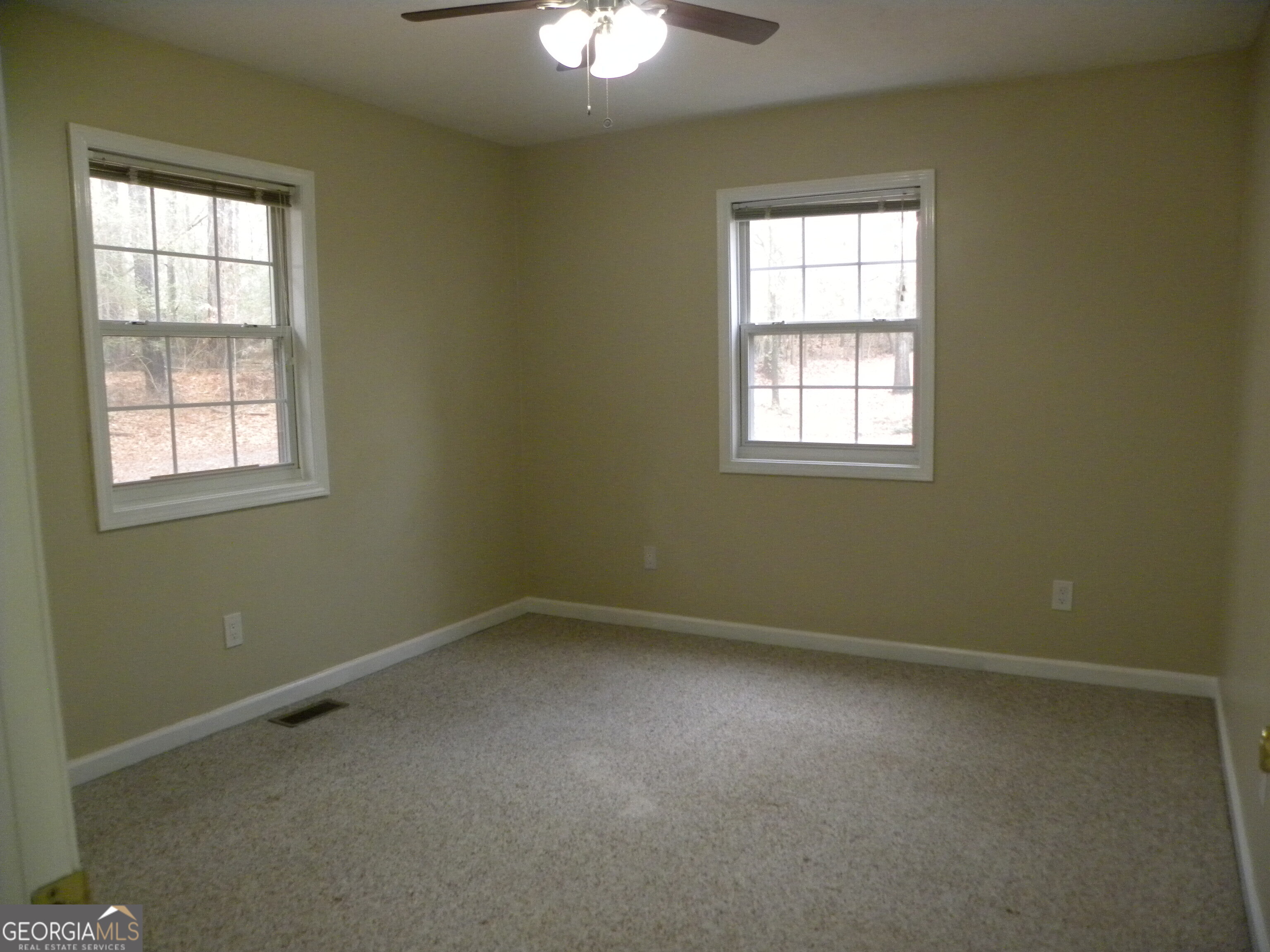 101 And 103 Joy Lane, Unit DUPLEX Hartwell, GA 30643 - Photo 22 of 24 an empty room with a window