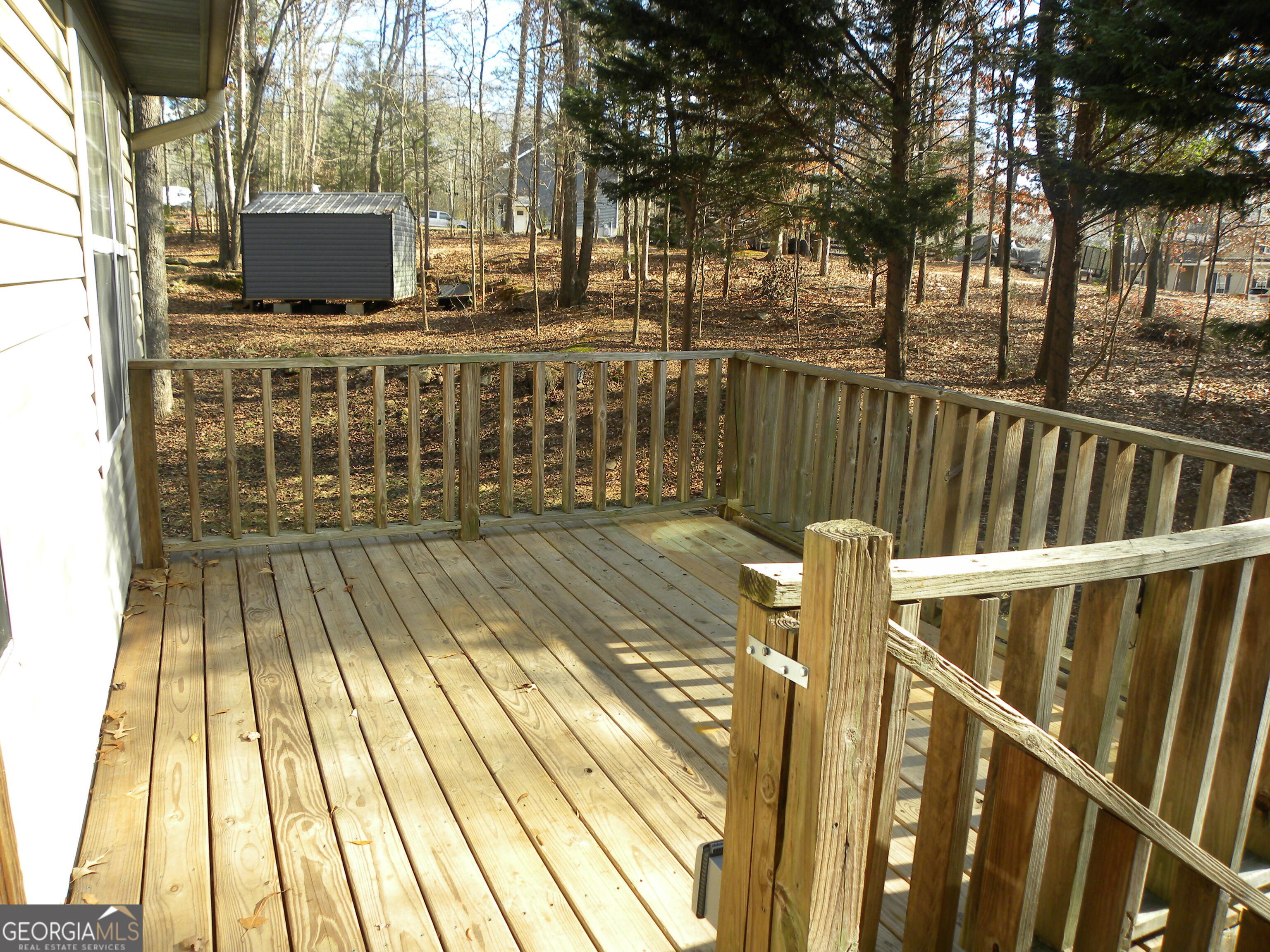 101 And 103 Joy Lane, Unit DUPLEX Hartwell, GA 30643 - Photo 4 of 24 a view of balcony with wooden floor and outdoor space
