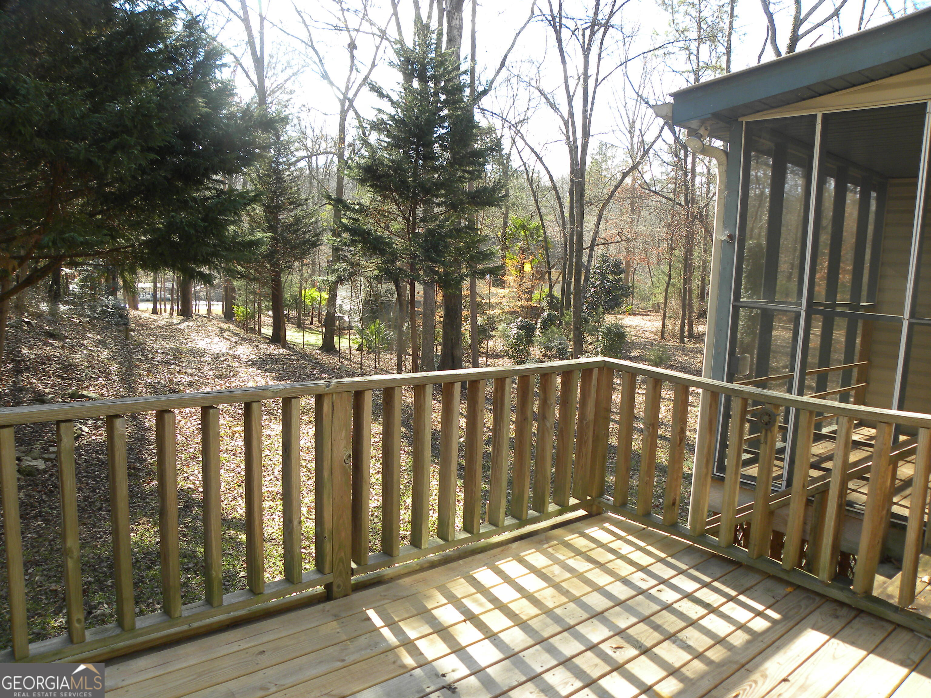 101 And 103 Joy Lane, Unit DUPLEX Hartwell, GA 30643 - Photo 5 of 24 a view of a wooden fence