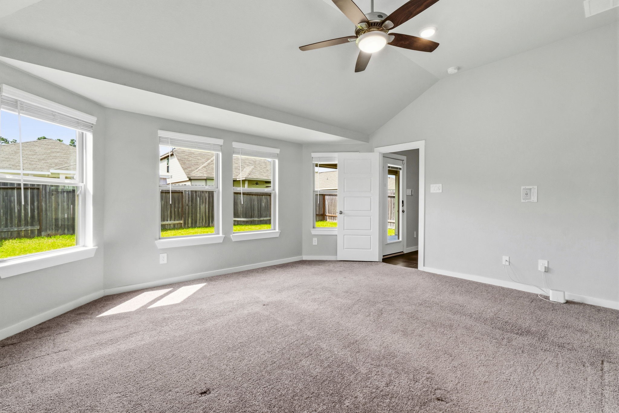 22235 Cardinal Crest Lane New Caney, TX 77357 - Photo 14 of 41 Spacious primary suite featuring a beautiful bay window sitting area.