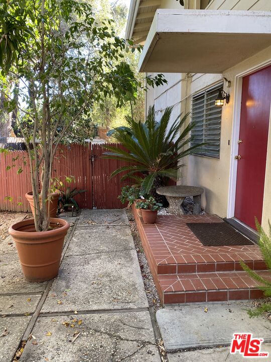 16464 Sunset Boulevard Pacific Palisades, CA 90272 - Photo 1 of 13 a house view with a backyard space