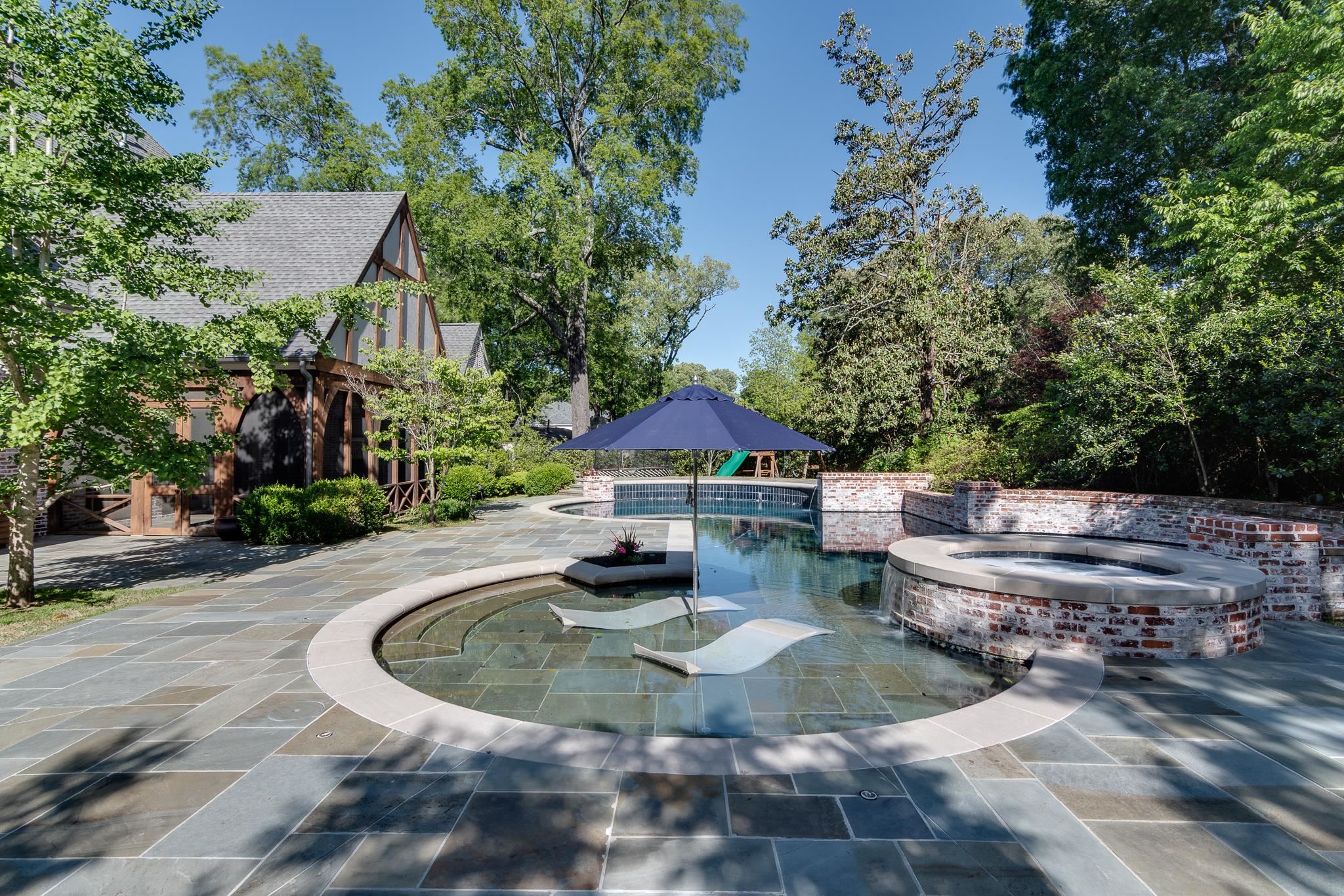 4761 Shady Grove Road Memphis, TN 38117 - Photo 23 of 25 a view of a swimming pool with a patio