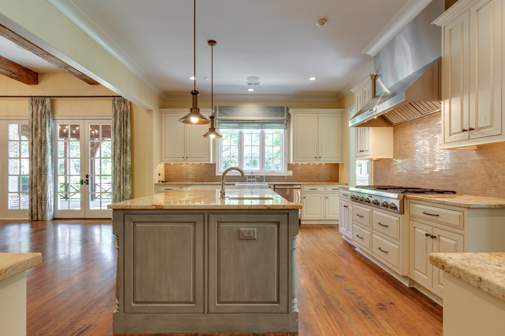 4761 Shady Grove Road Memphis, TN 38117 - Photo 7 of 25 a kitchen with granite countertop a sink a counter space appliances and cabinets