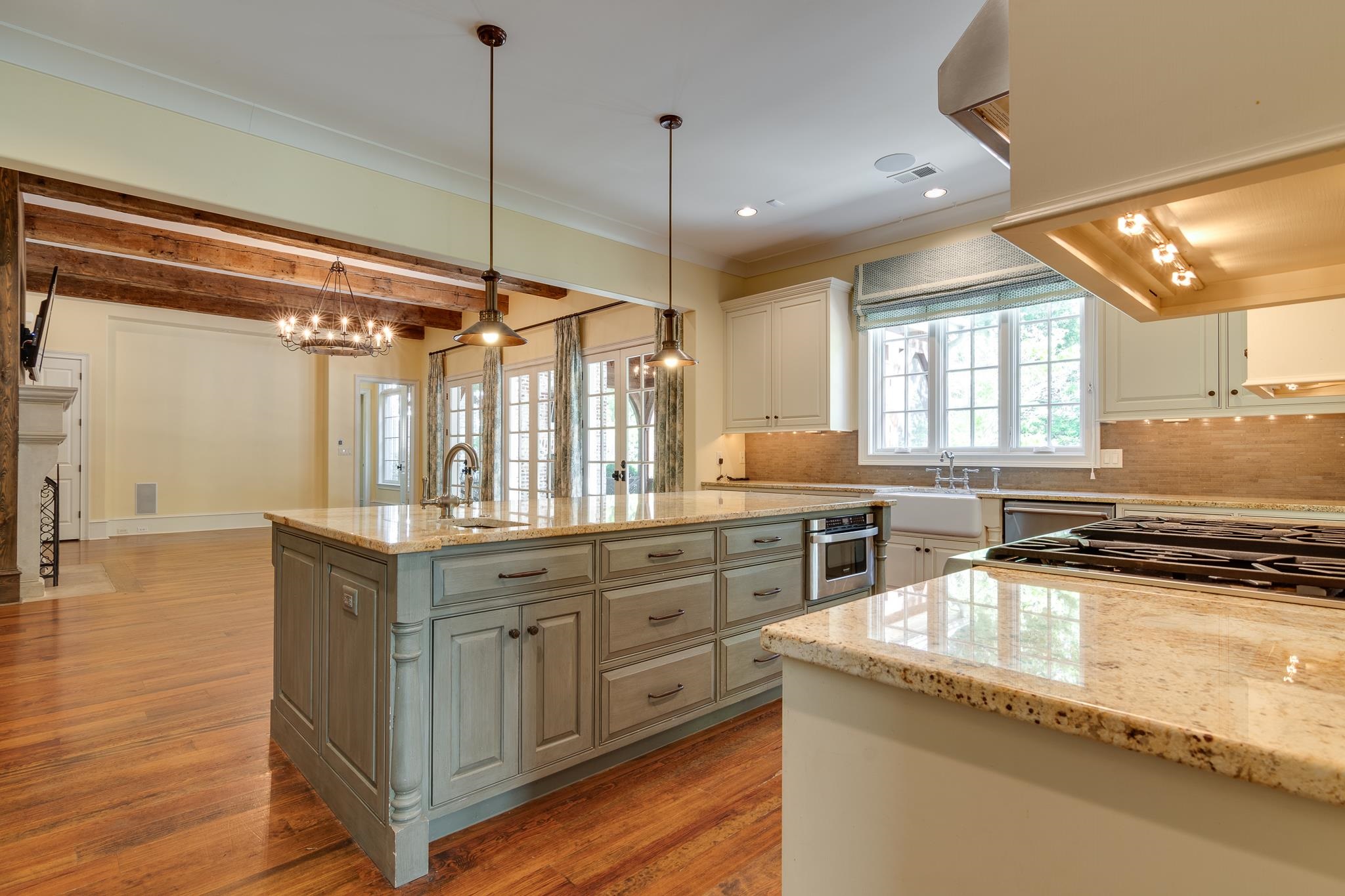 4761 Shady Grove Road Memphis, TN 38117 - Photo 8 of 25 a kitchen with granite countertop a sink a counter top space and cabinets