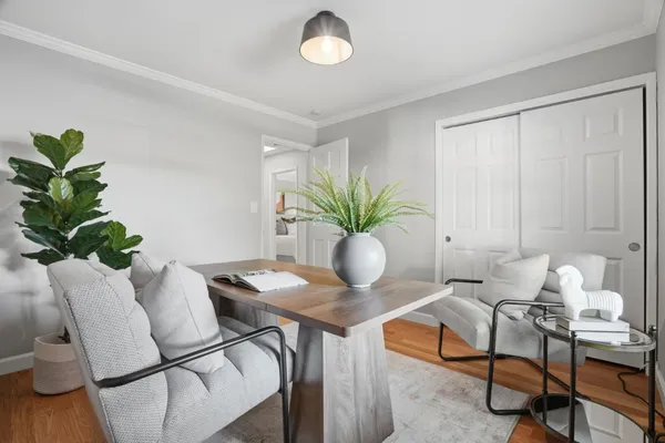 a bathroom with a double vanity sink and a window