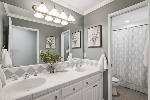 a view from deck having patio