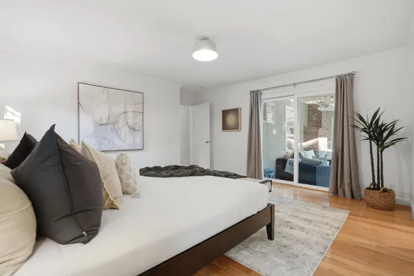 a view of a chairs and table in the patio