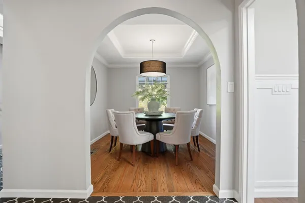 a kitchen with a stove and a large window
