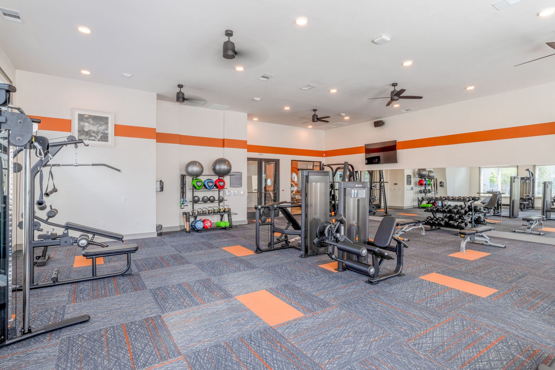 13939 Hillcroft Avenue, Unit 10103 Houston, TX 77085 - Photo 18 of 23 a view of a room with gym equipment
