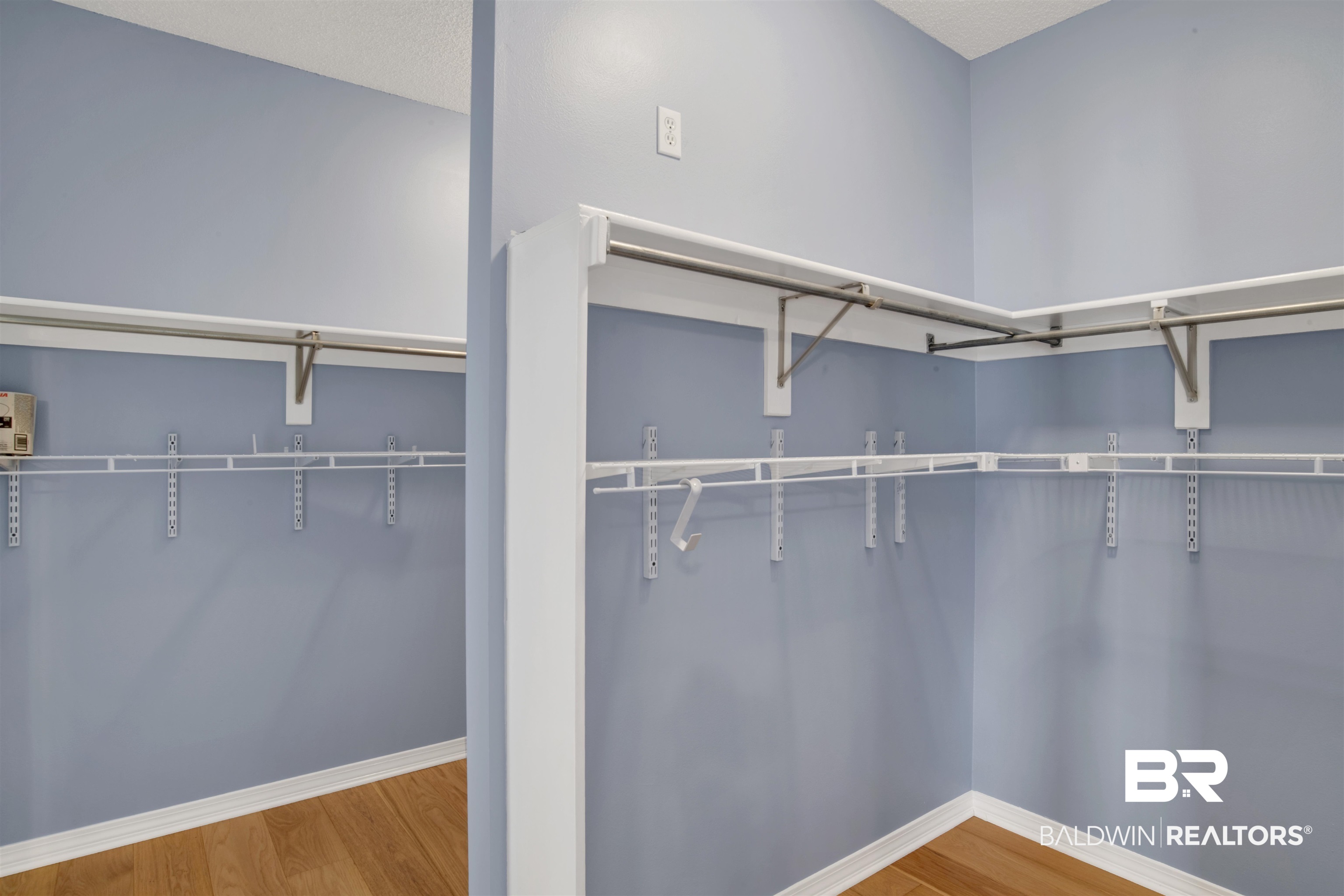 125 Woodruff Court Mobile, AL 36608 - Photo 19 of 27 Walk in closet featuring hardwood / wood-style flooring