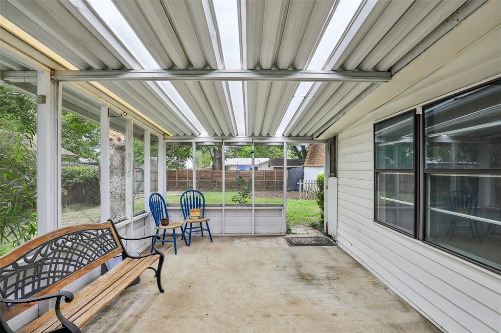 1810 Ridgewood Street Irving, TX 75062 - Photo 15 of 19 Relaxing screened in sunroom
