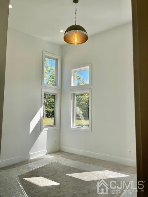 13 Emerald Road Kendall Park, NJ 08824 - Photo 13 of 24 a view of an empty room with a window