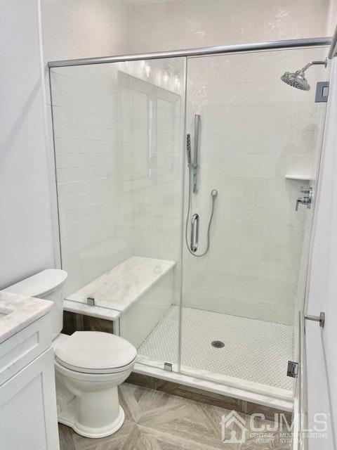 13 Emerald Road Kendall Park, NJ 08824 - Photo 16 of 24 a bathroom with a shower and a toilet