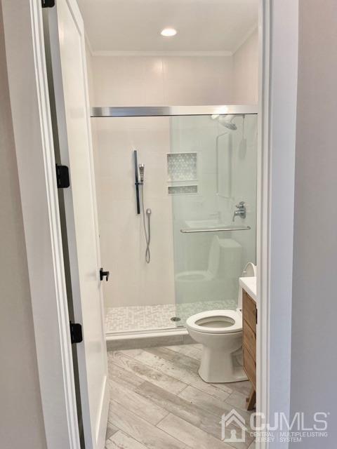 13 Emerald Road Kendall Park, NJ 08824 - Photo 20 of 24 a bathroom with a granite countertop shower and a toilet