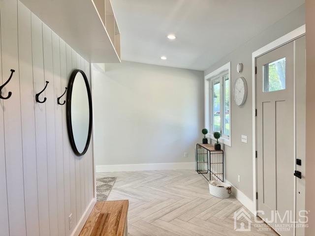 13 Emerald Road Kendall Park, NJ 08824 - Photo 3 of 24 a room with a door and a rug