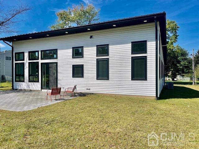 13 Emerald Road Kendall Park, NJ 08824 - Photo 24 of 24 a front view of a house with a yard
