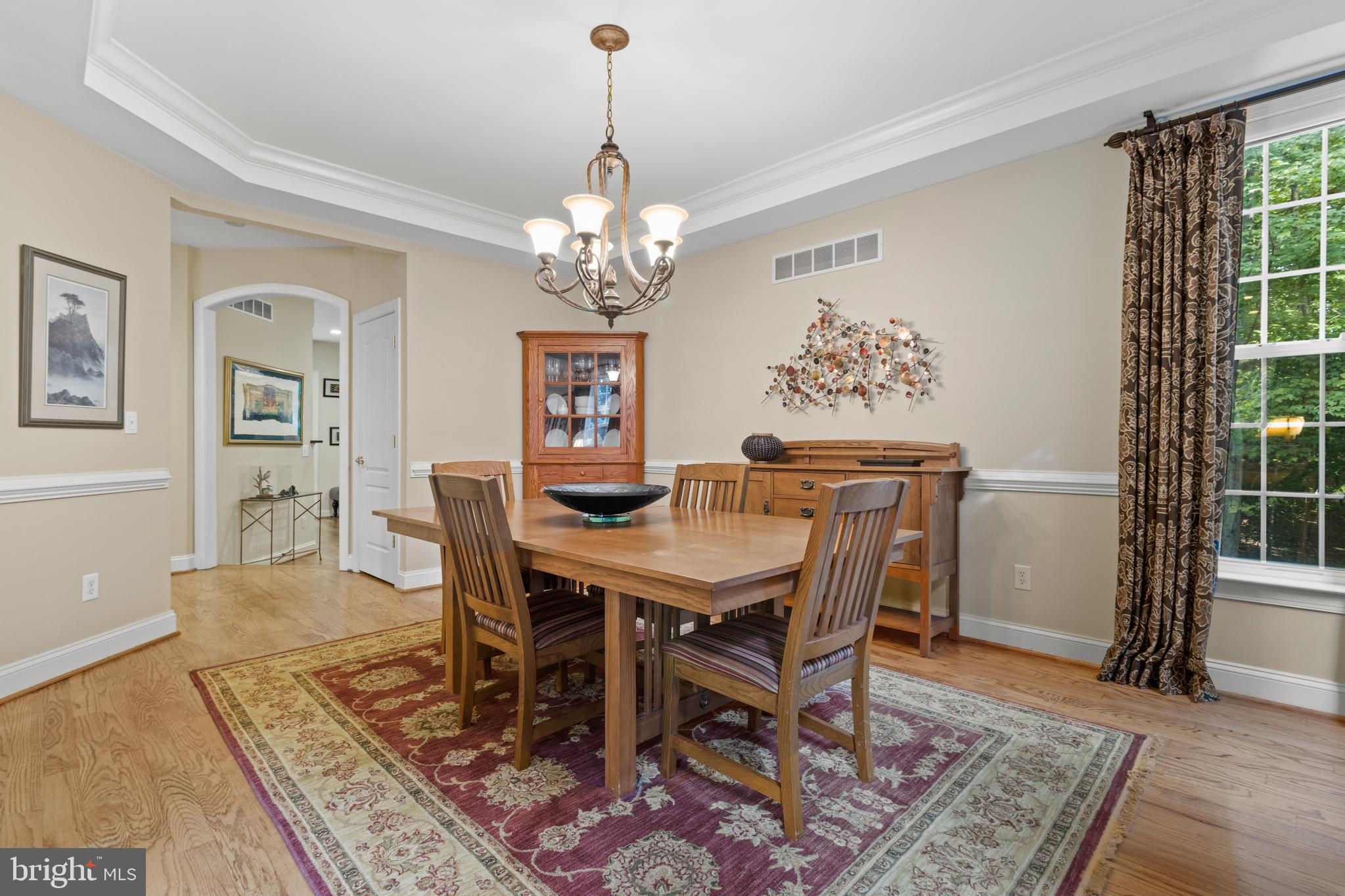 264 Woodard Road Arnold, MD 21012 - Photo 18 of 62 Tray ceiling and fancy mouldings and trim accents.