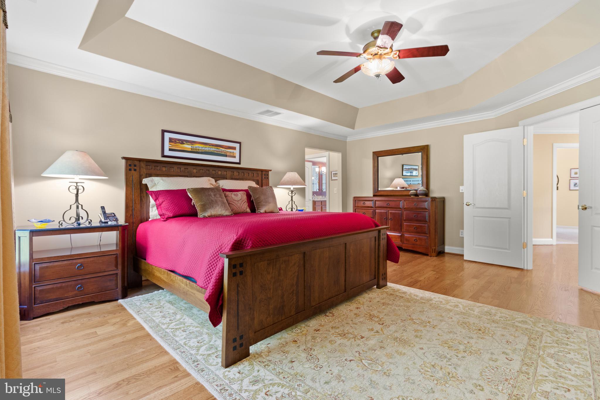 264 Woodard Road Arnold, MD 21012 - Photo 36 of 62 Tray ceiling with light and fan fits a king bed.