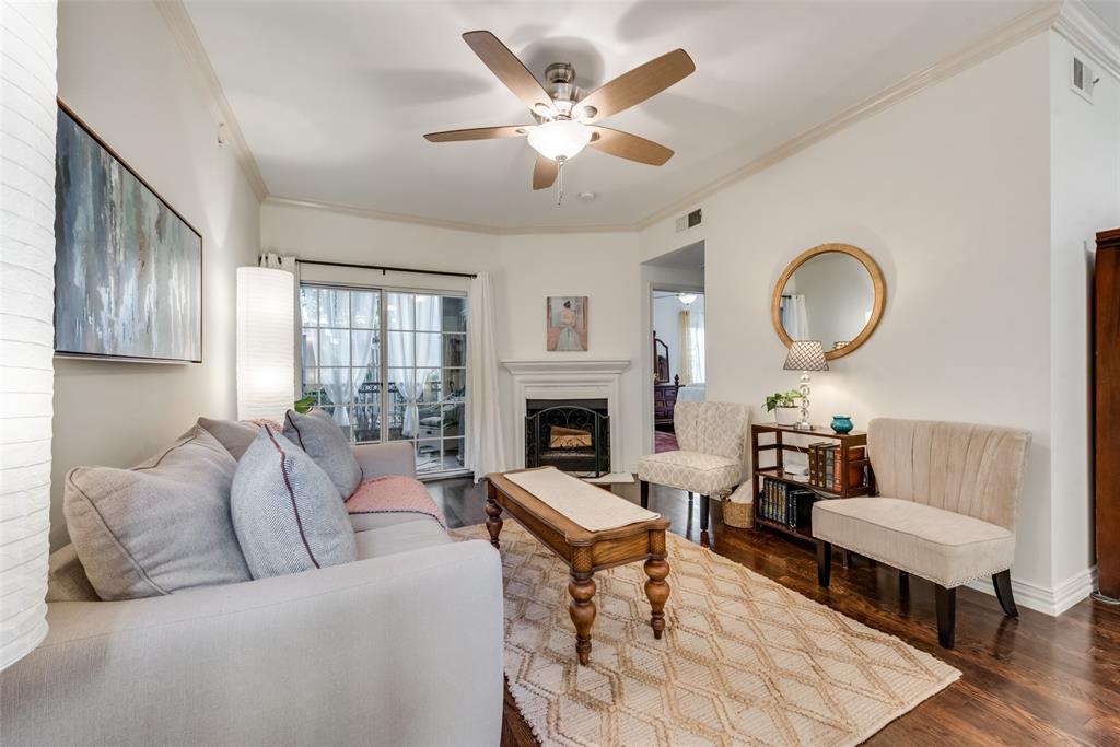 2601 Preston Road, Unit 4102 Plano, TX 75093 - Photo 1 of 1 a living room with furniture and a fireplace