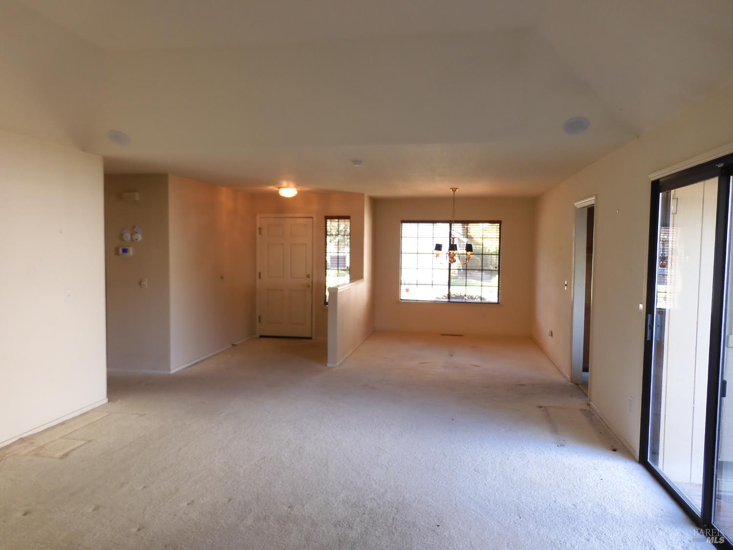 356 Singing Brook Circle Santa Rosa, CA 95409 - Photo 7 of 36 a view of empty room with windows
