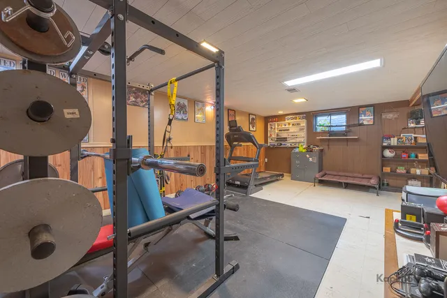 a kitchen with appliances cabinets and a sink