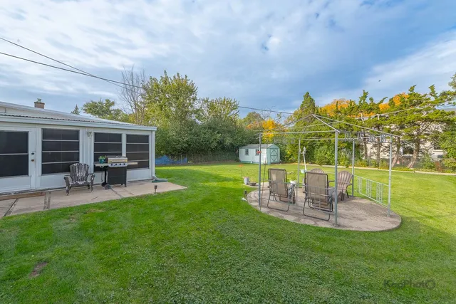 a garden view with a seating space