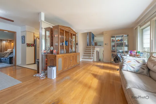 a view of a living room hardwood and bedroom