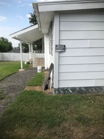 a view of a back yard of the house