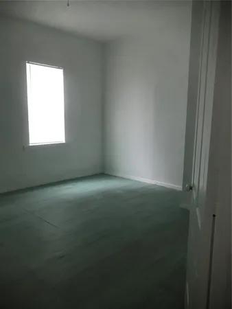 an empty room with a window