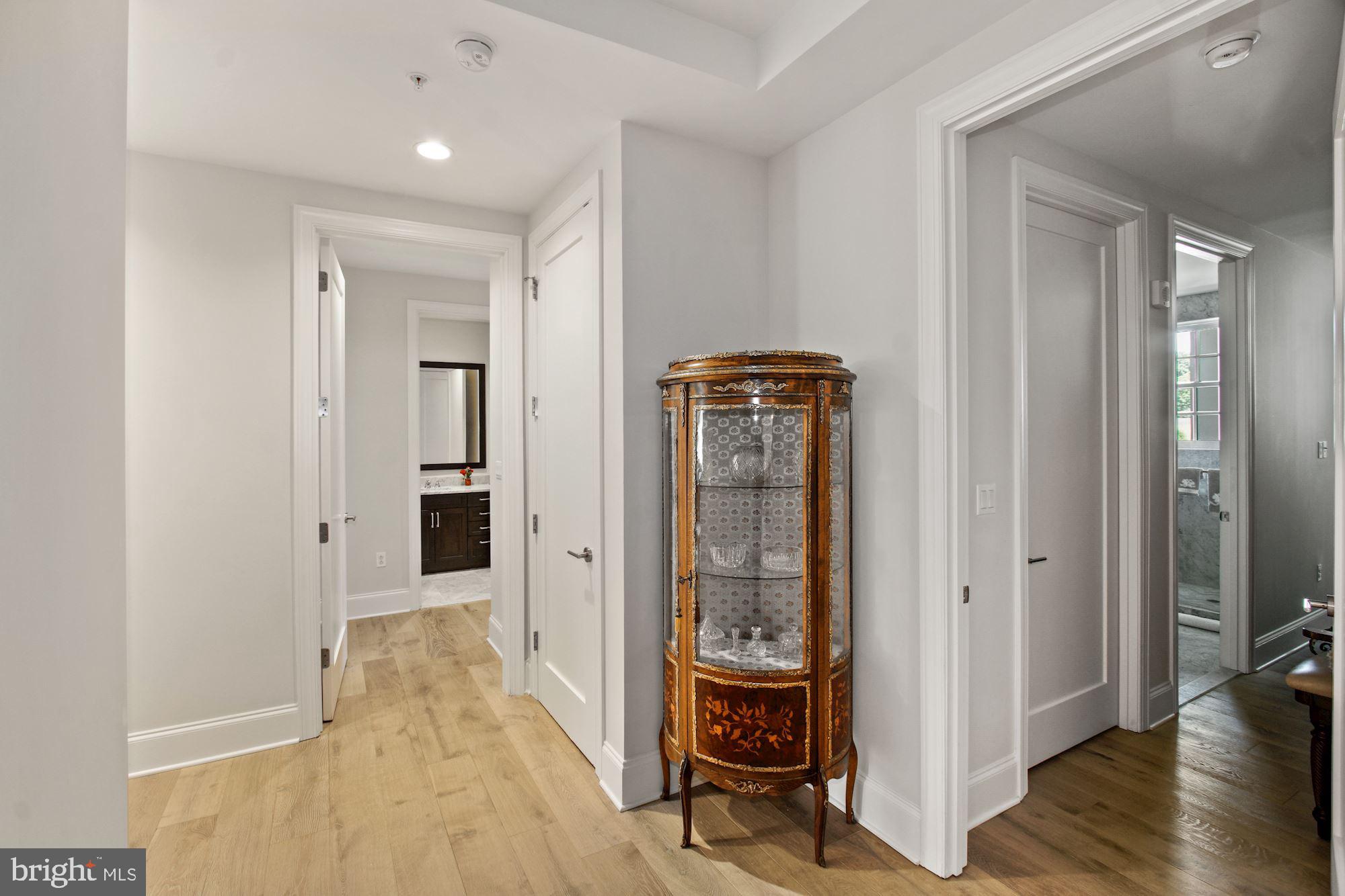 8111 River Road, Unit 153 Bethesda, MD 20817 - Photo 16 of 21 Hall to Third Bedroom with Private Bathroom