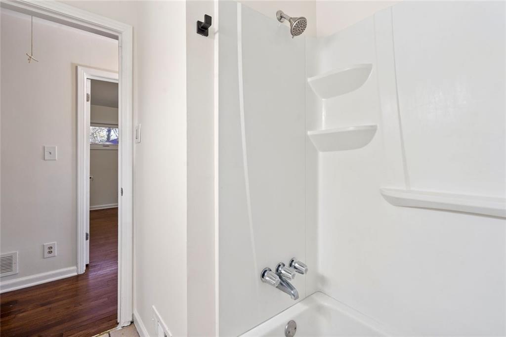 1321 Snapfinger Road Decatur, GA 30032 - Photo 14 of 22 a bathroom with a shower