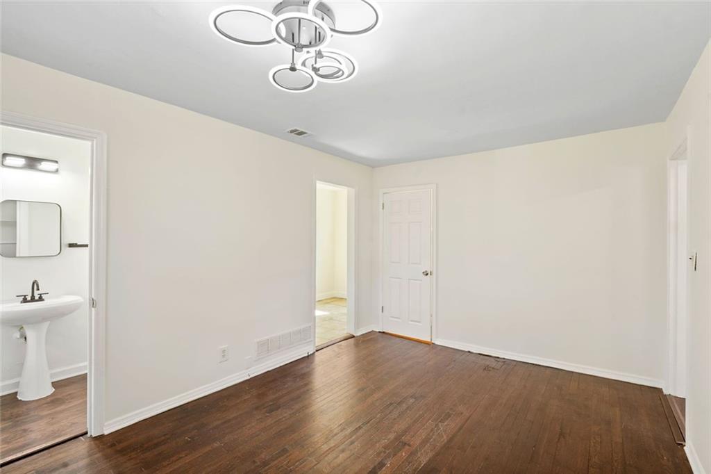 1321 Snapfinger Road Decatur, GA 30032 - Photo 16 of 22 a view of a hallway with wooden floor