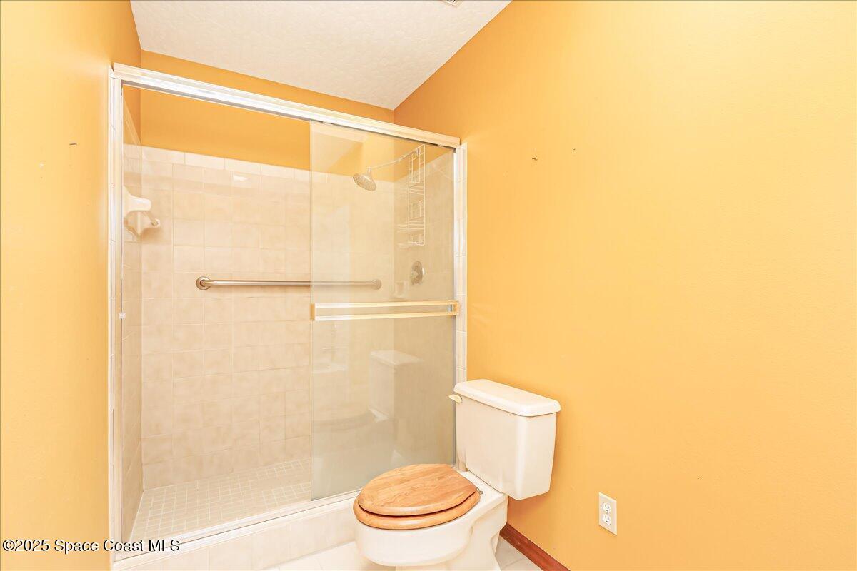 883 Ridge Lake Drive Melbourne, FL 32940 - Photo 14 of 27 Walk-in shower