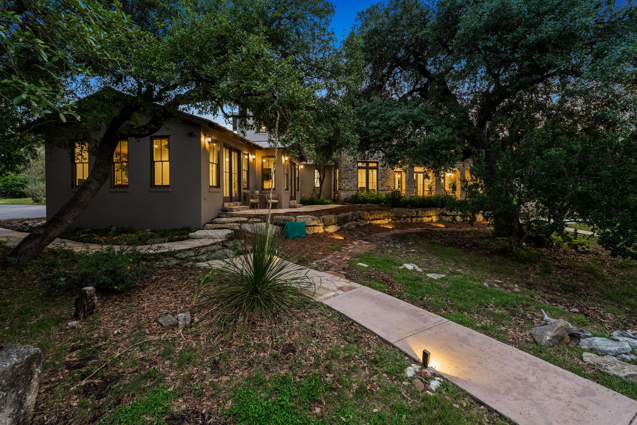 195 Desert Flower Spring Branch, TX 78070 - Photo 38 of 40 Stone and stucco exterior with multiple windows