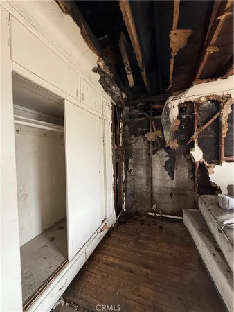 a bathroom with a granite countertop sink a toilet and bathtub