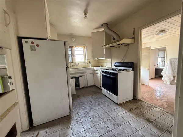 a bathroom with a sink and a window