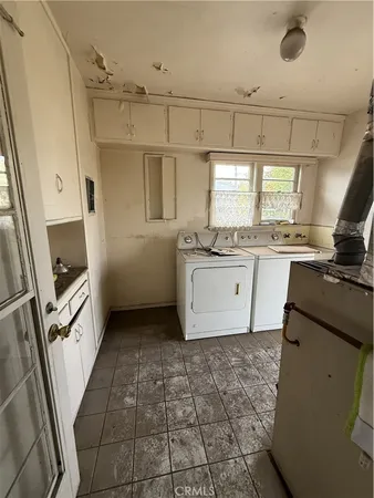 a view of living room and utility room