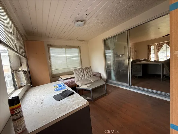 a view of house with yard and covered with snow