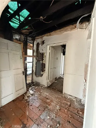 a view of a hallway with a shower