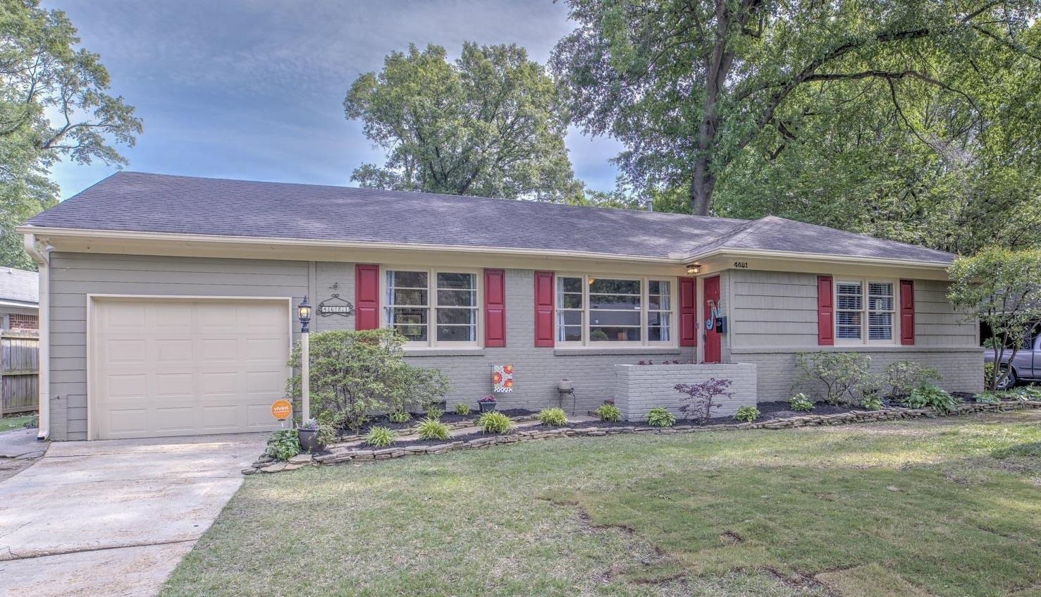 4681 Kaye Road Memphis, TN 38117 - Photo 1 of 25 a front view of a house with garden
