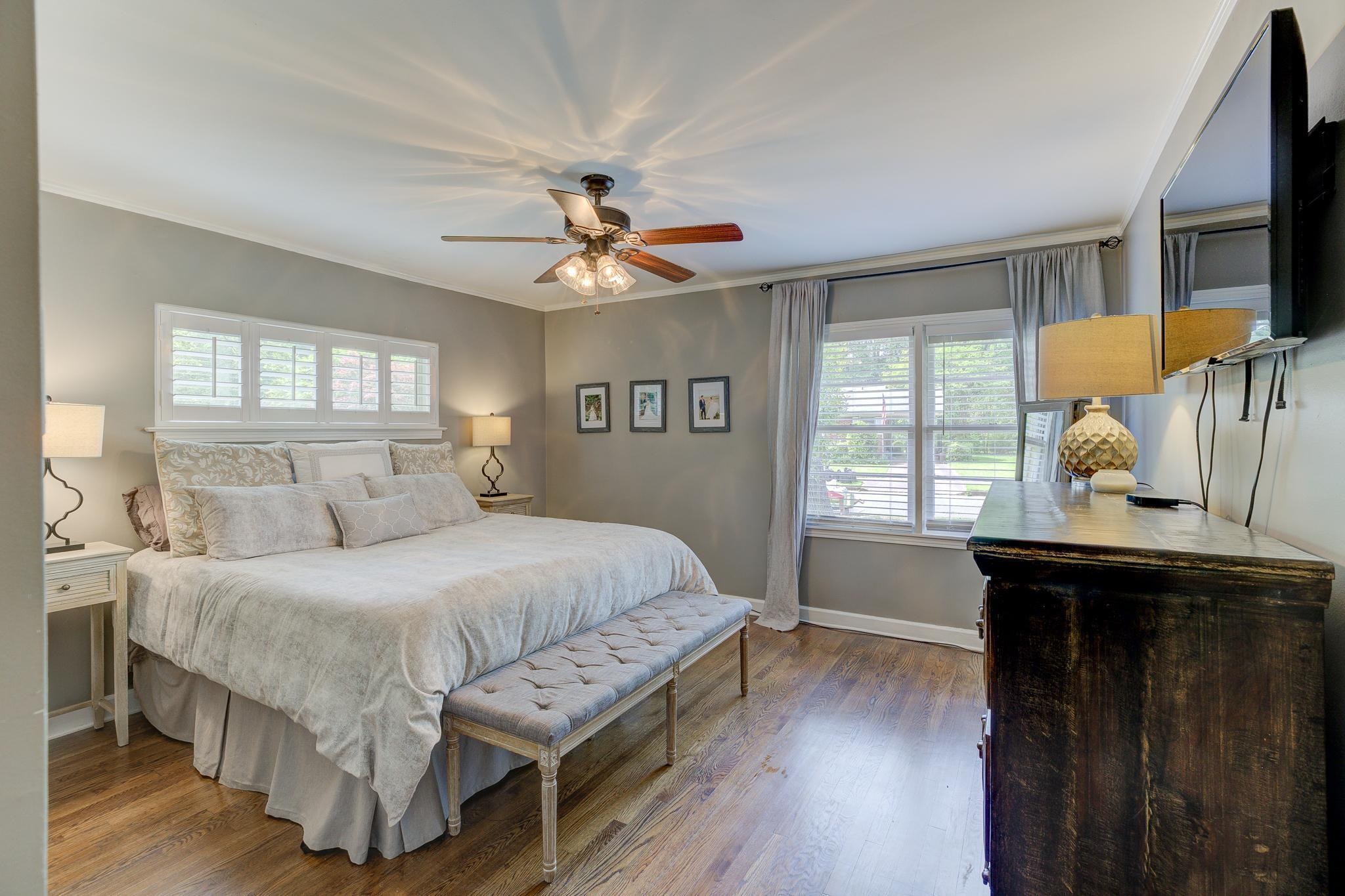 4681 Kaye Road Memphis, TN 38117 - Photo 13 of 25 a bedroom with a bed and wooden floor