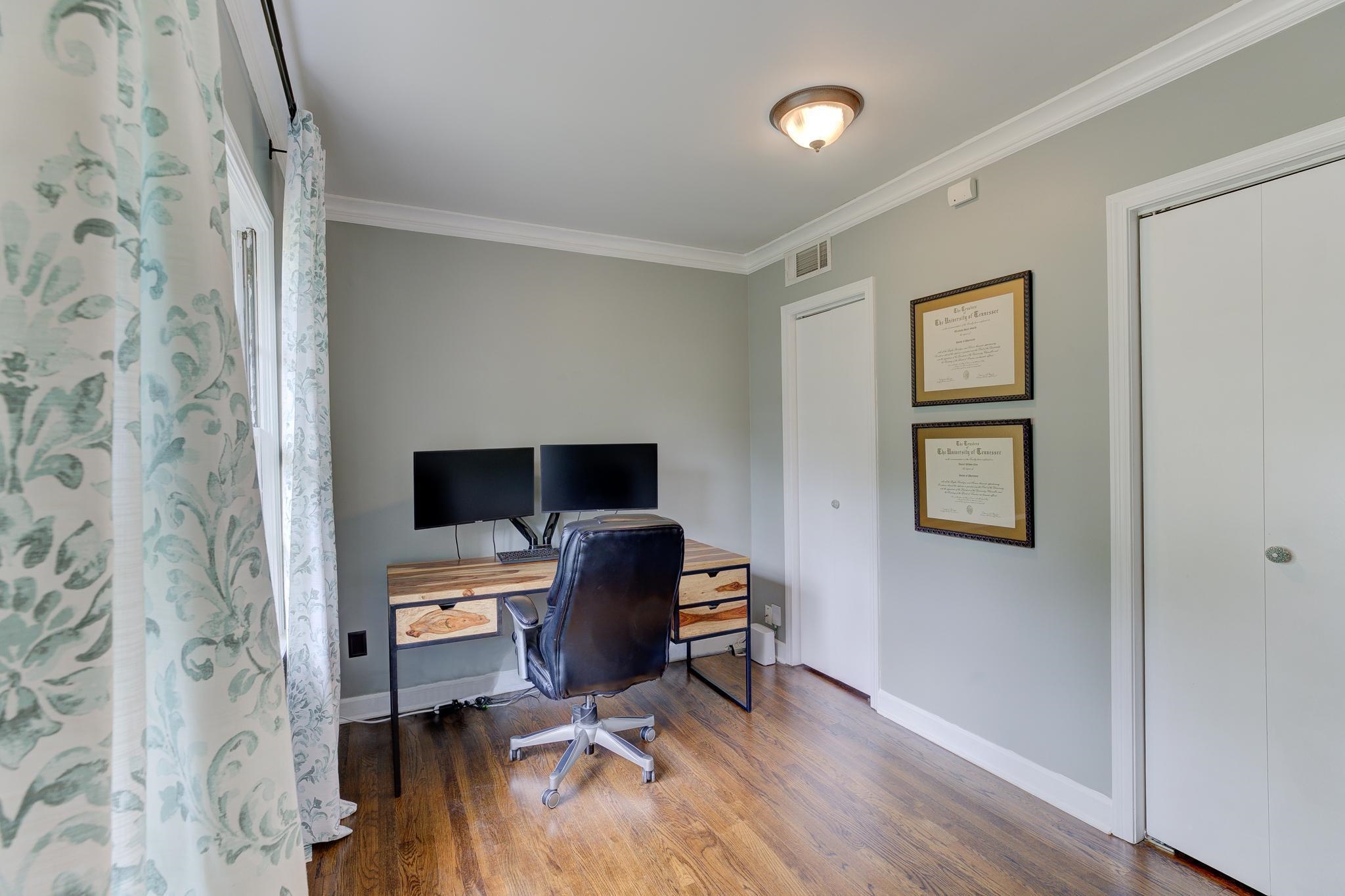 4681 Kaye Road Memphis, TN 38117 - Photo 18 of 25 a view of a workspace with furniture and wooden floor