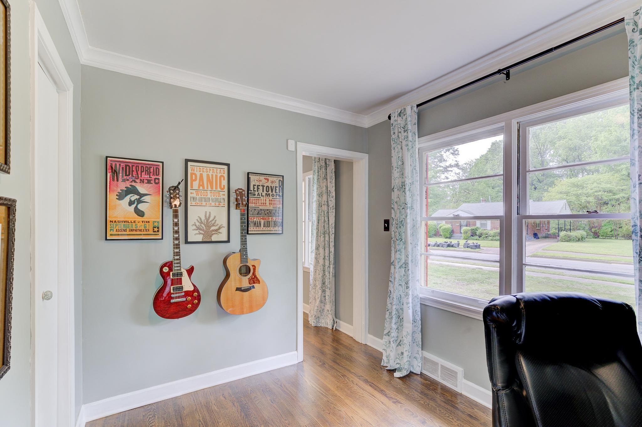 4681 Kaye Road Memphis, TN 38117 - Photo 19 of 25 a view of a livingroom with furniture hardwood floor and workspace