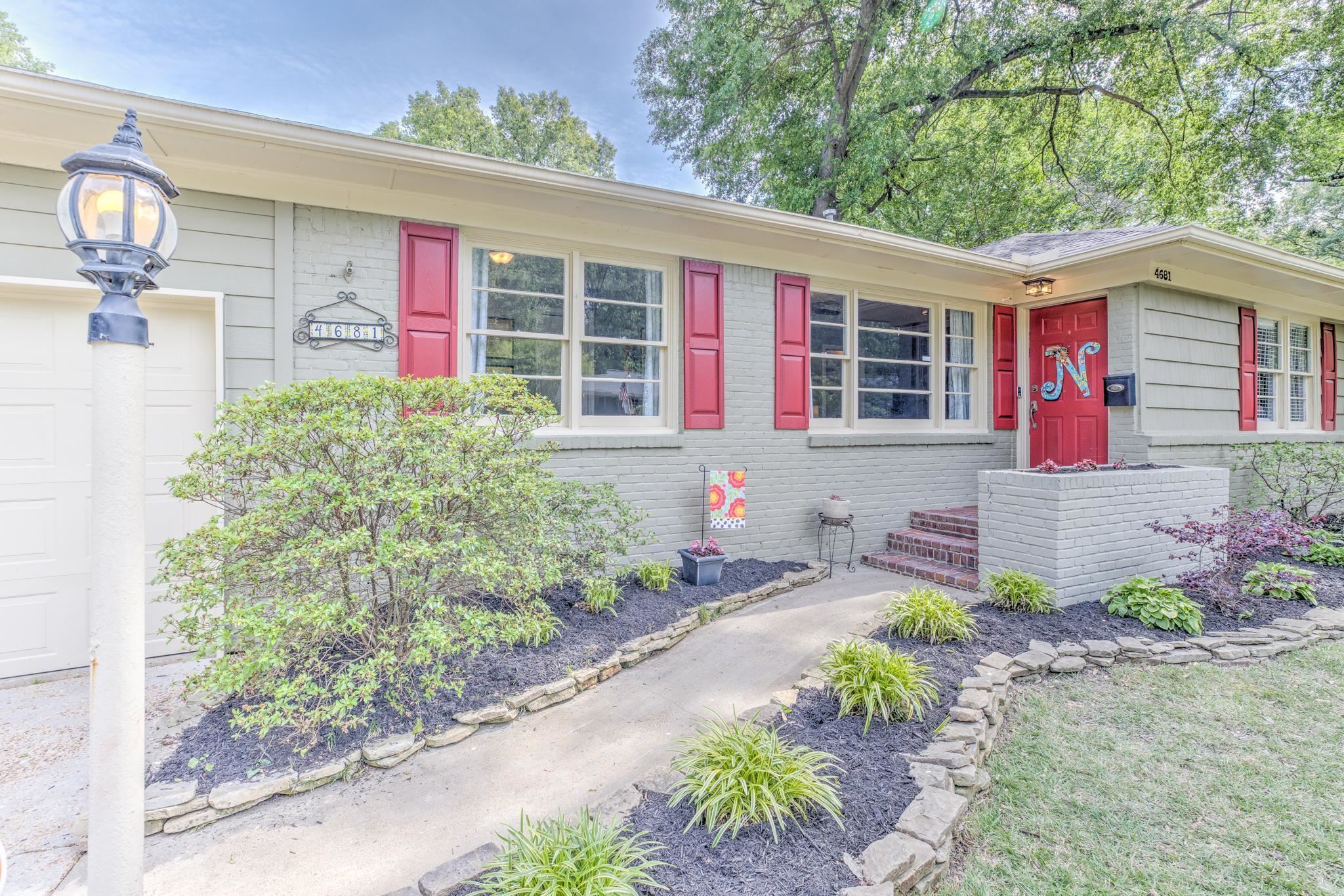 4681 Kaye Road Memphis, TN 38117 - Photo 2 of 25 a front view of a house with garden